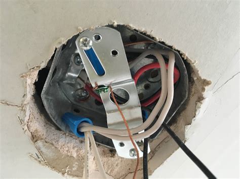 how to install ceiling electrical mounting box in a basement|installing ceiling light electrical box.